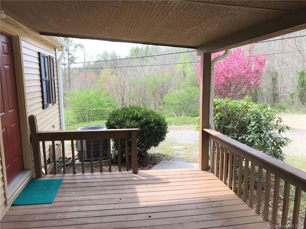 7 Pink Fox Ridge Road Weaverville, NC 28787 - Photo 3 of 12 a view of a balcony with wooden floor