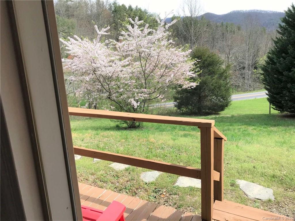 7 Pink Fox Ridge Road Weaverville, NC 28787 - Photo 4 of 12 a view of a yard from a window