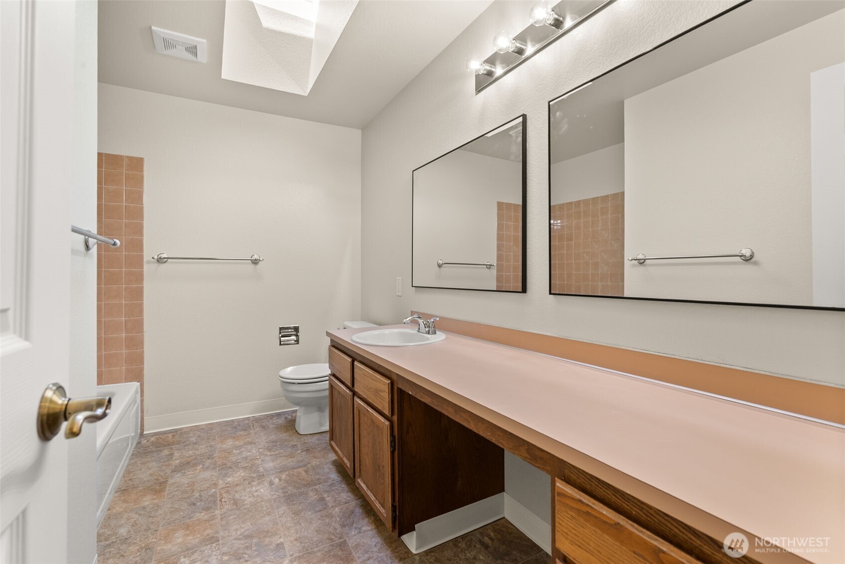 13603 Southeast 239th Street Kent, WA 98042 - Photo 17 of 23 a bathroom with a sink and a toilet