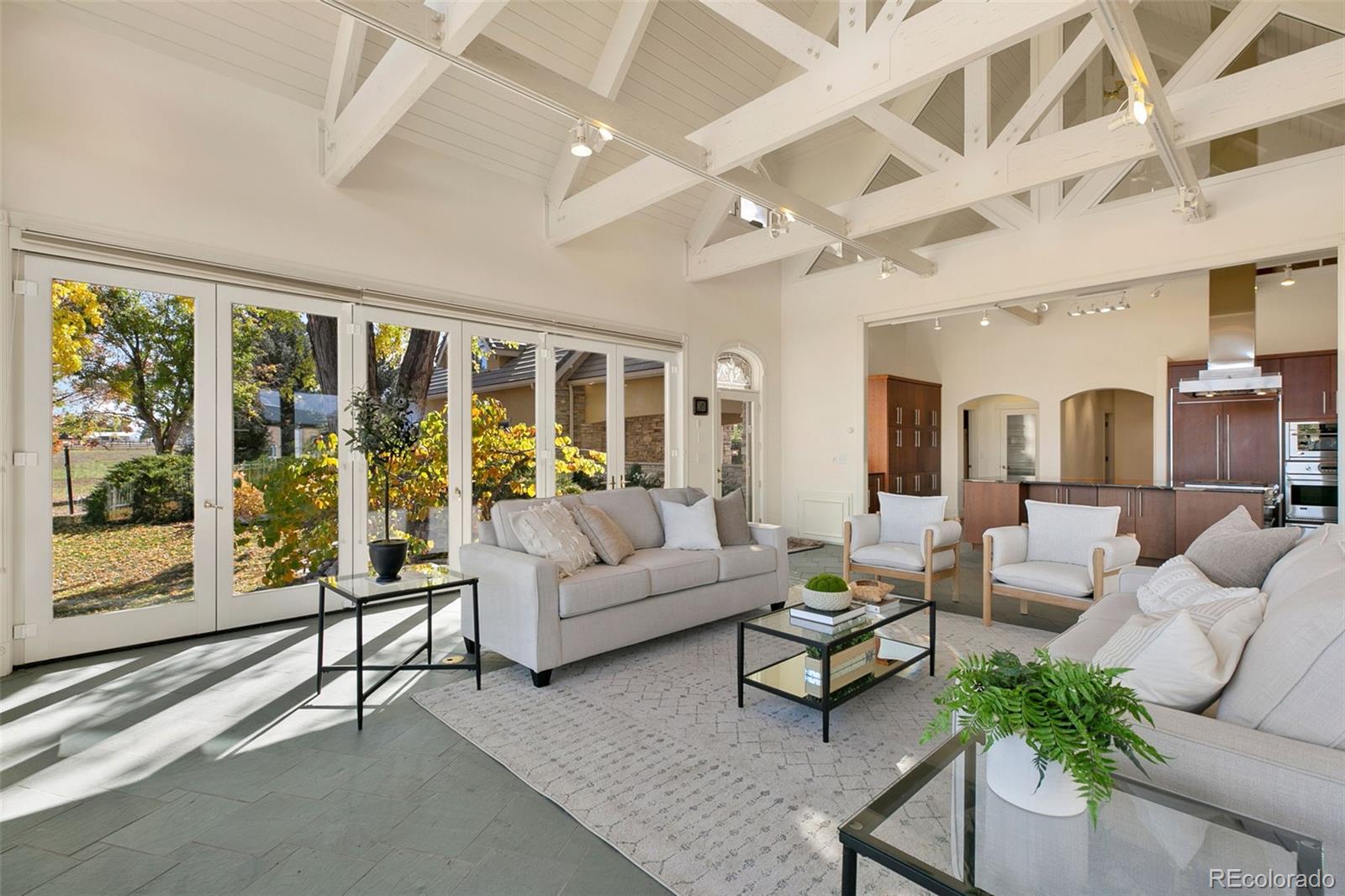 2400 Terry Lake Road Fort Collins, CO 80524 - Photo 14 of 44 a living room with furniture and a large window