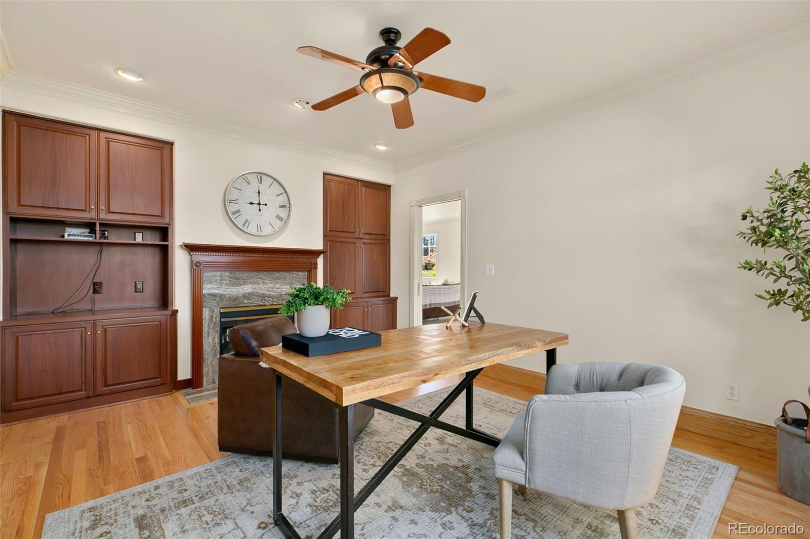 2400 Terry Lake Road Fort Collins, CO 80524 - Photo 15 of 44 a living room with furniture and a wooden floor