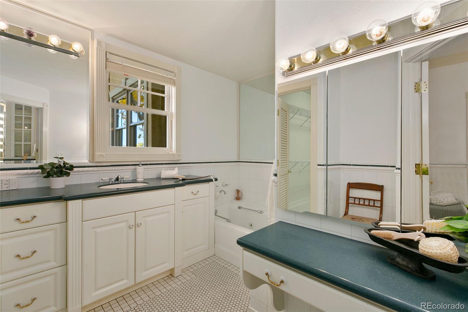 2400 Terry Lake Road Fort Collins, CO 80524 - Photo 18 of 44 a kitchen with a sink and a refrigerator