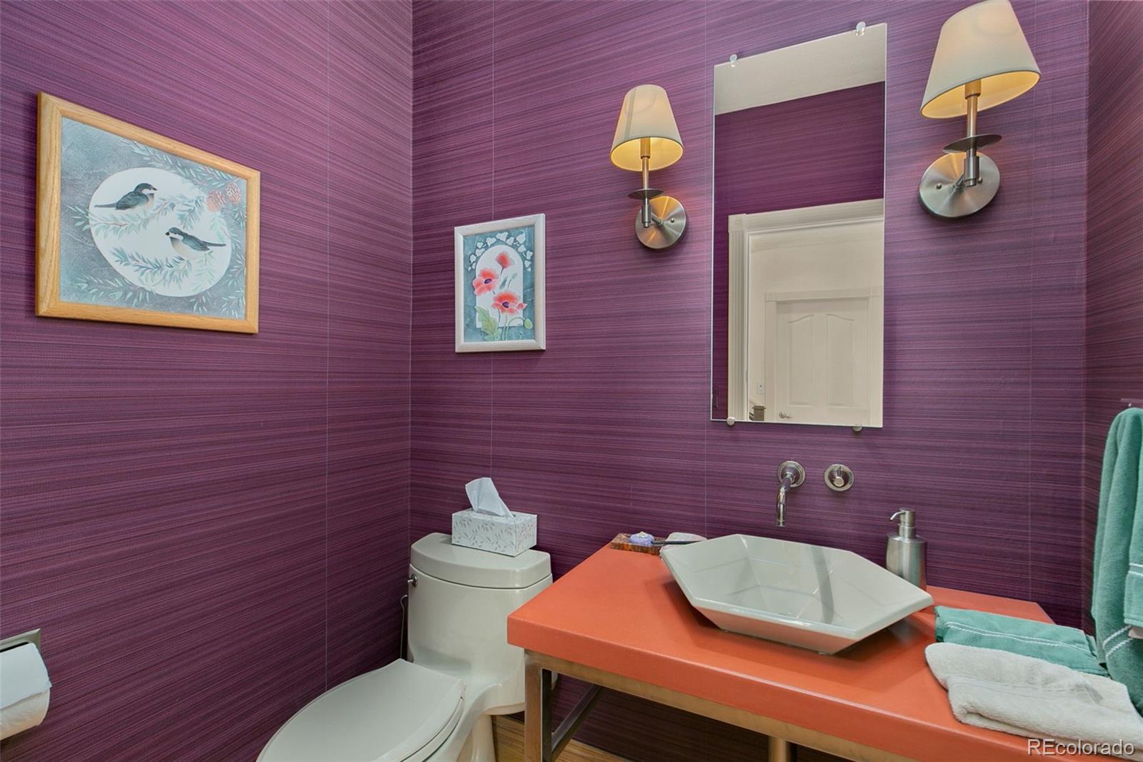 2400 Terry Lake Road Fort Collins, CO 80524 - Photo 20 of 44 a bathroom with a sink mirror vanity and toilet
