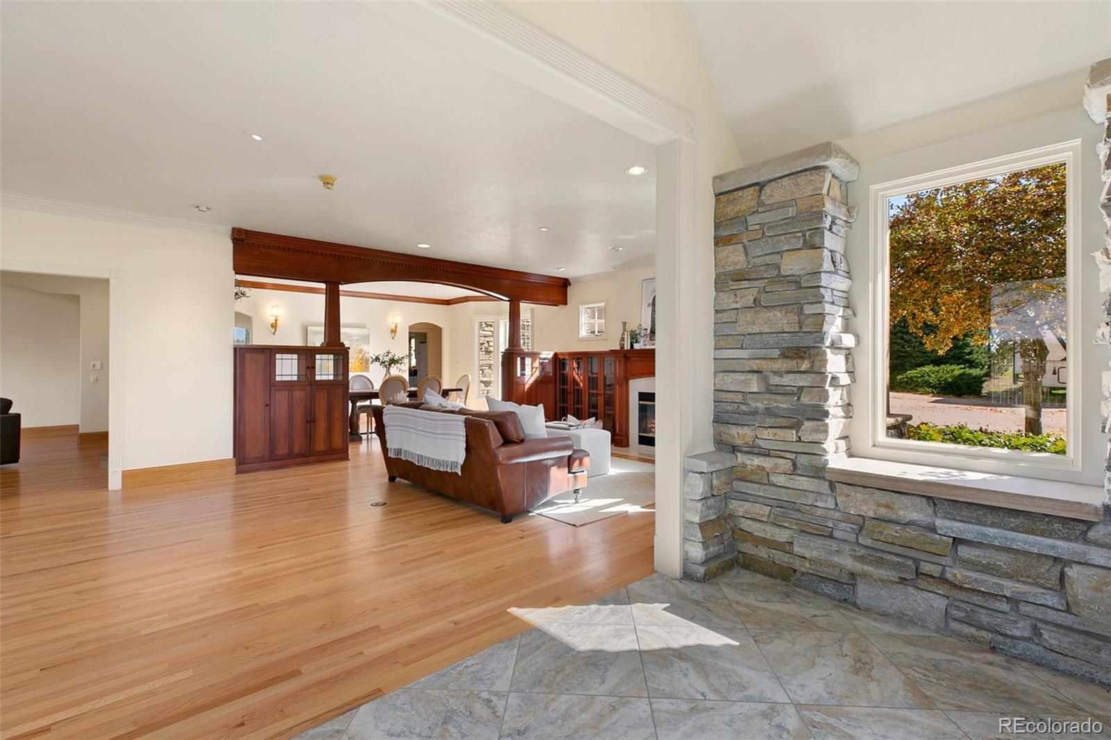 2400 Terry Lake Road Fort Collins, CO 80524 - Photo 2 of 44 a living room with furniture and a large window