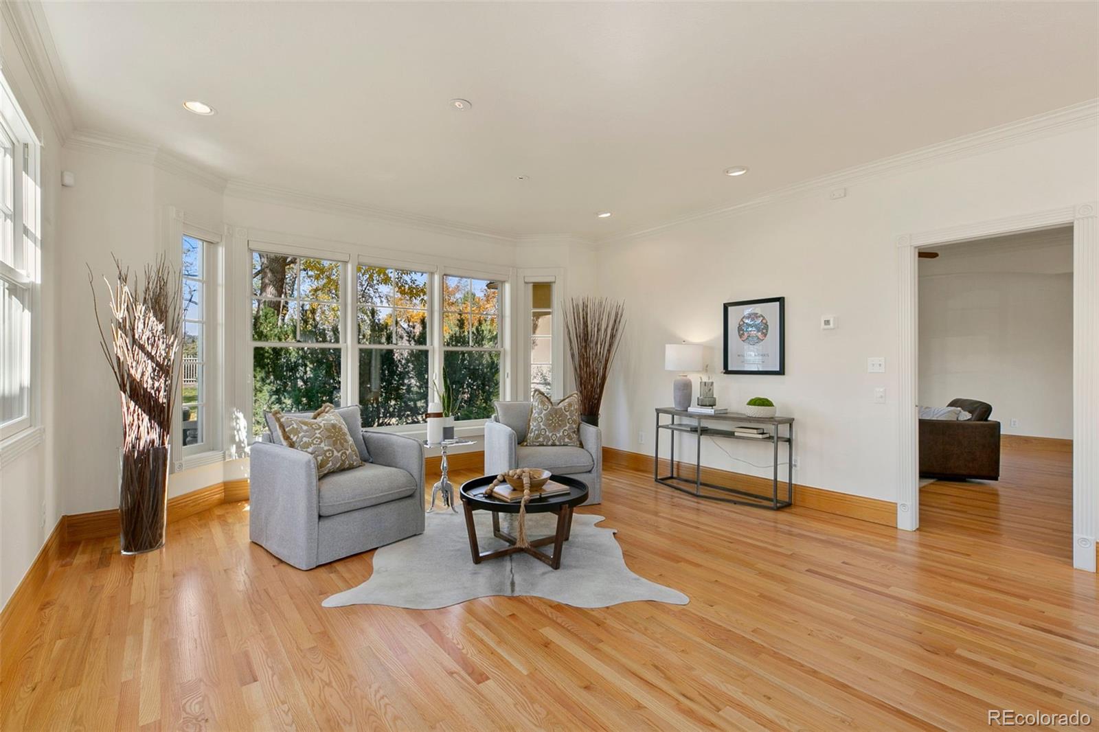2400 Terry Lake Road Fort Collins, CO 80524 - Photo 3 of 44 a living room with furniture and a wooden floor