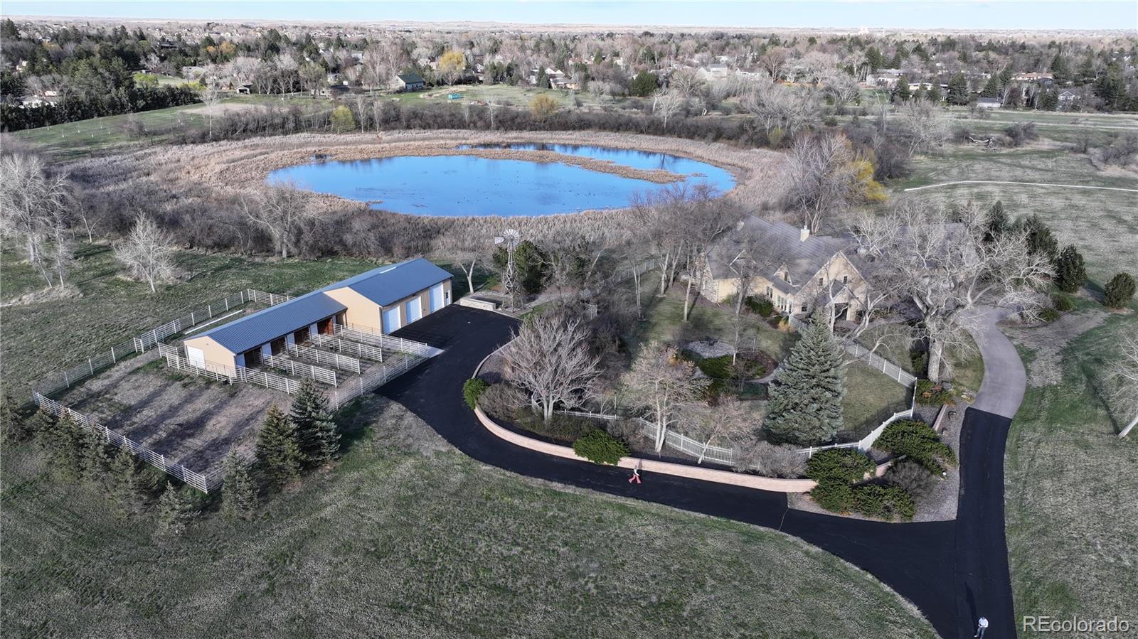 2400 Terry Lake Road Fort Collins, CO 80524 - Photo 33 of 44 a view of a swimming pool with a yard