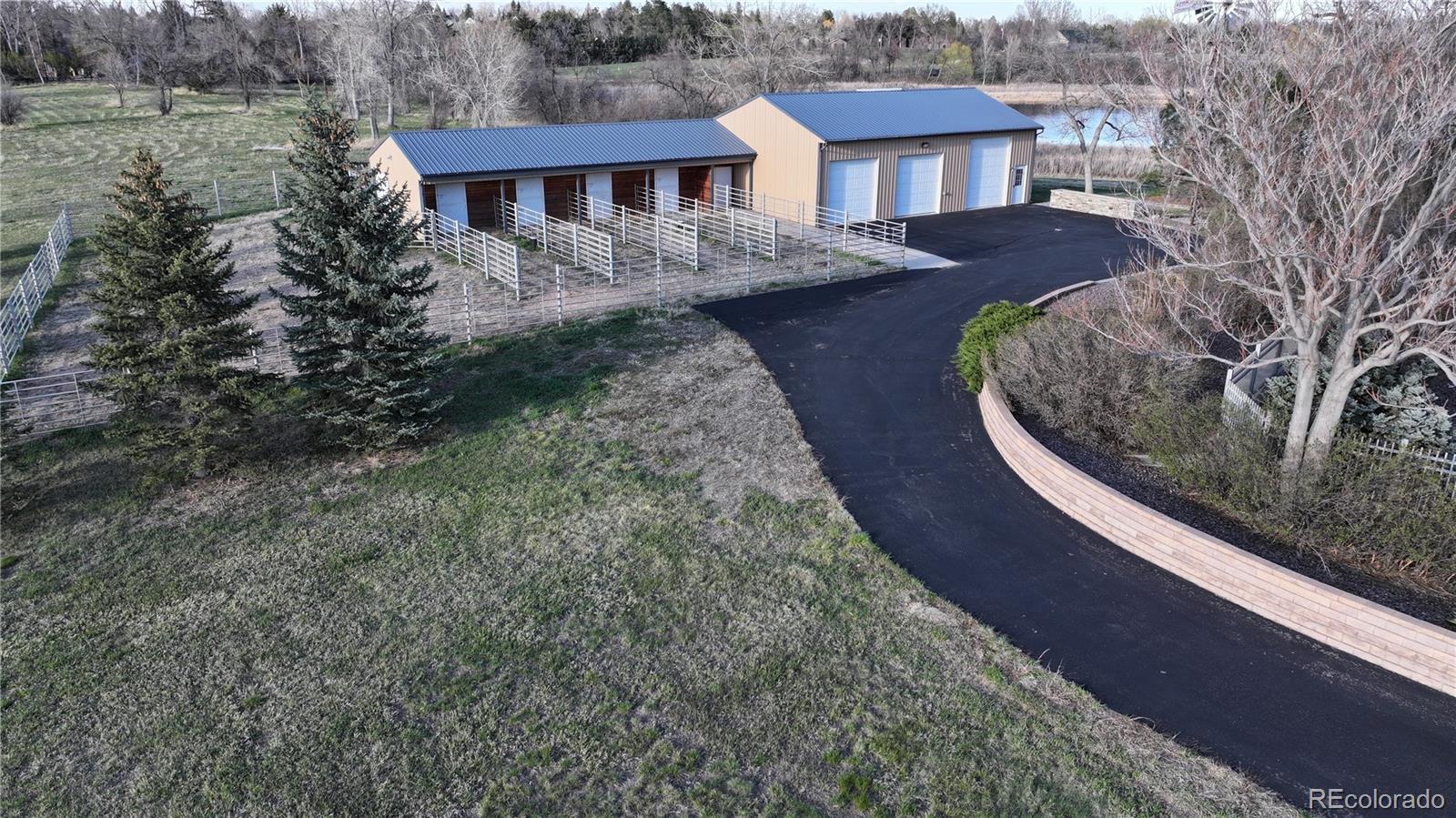 2400 Terry Lake Road Fort Collins, CO 80524 - Photo 37 of 44 a front view of a house with a yard