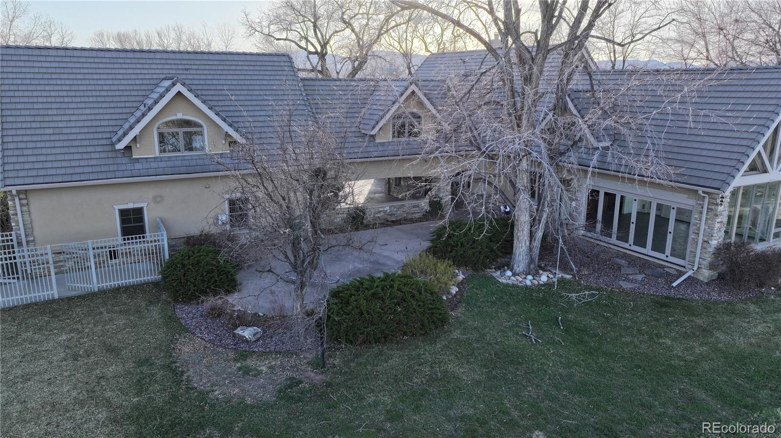 2400 Terry Lake Road Fort Collins, CO 80524 - Photo 44 of 44 front view of a house with a yard