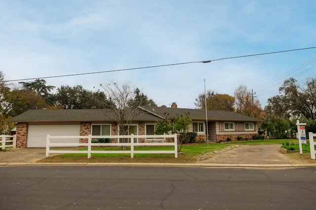 a view of a house with a swimming pool