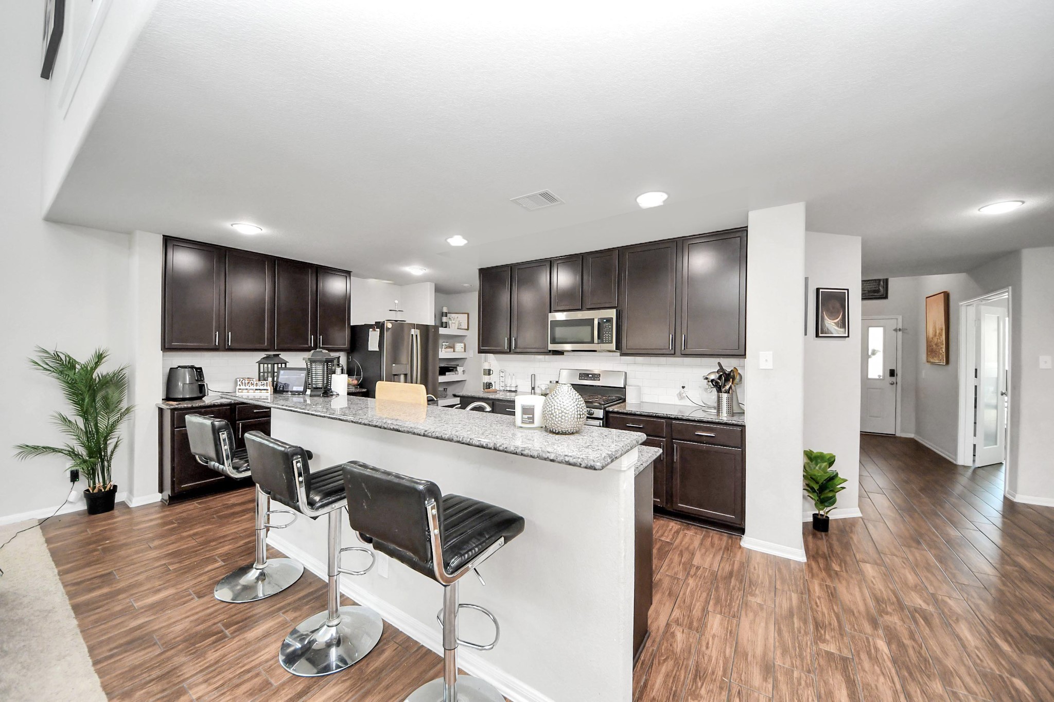 2643 Ridgeback Drive Rosenberg, TX 77471 - Photo 17 of 46 Full view of kitchen highlighting prep space and modern layout