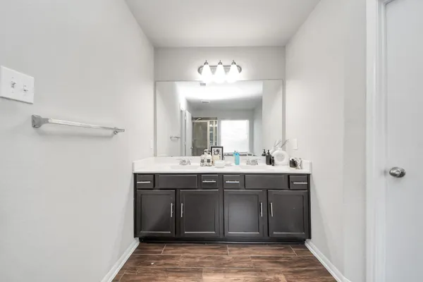a view of a kitchen from a windows and a sink