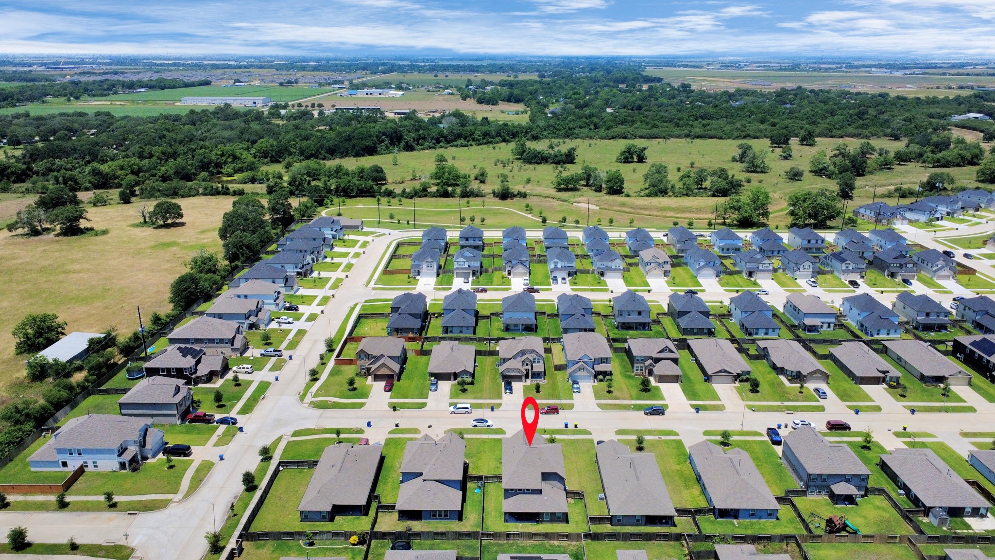 2643 Ridgeback Drive Rosenberg, TX 77471 - Photo 41 of 46 Wide-angle aerial shot showing the surrounding development and the home’s position in a growing community.