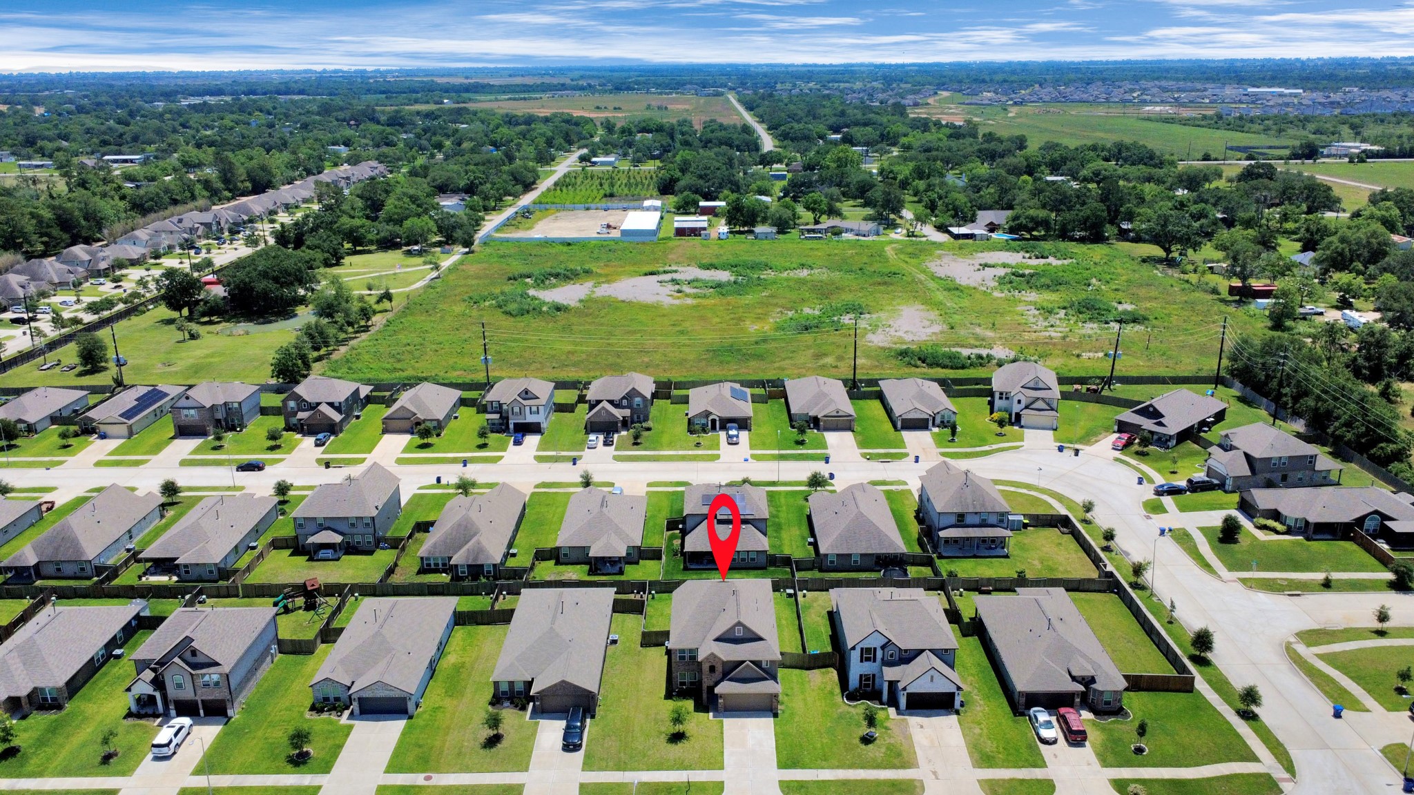2643 Ridgeback Drive Rosenberg, TX 77471 - Photo 42 of 46 Wide-angle aerial shot showing the surrounding development and the home’s position in a growing community.
