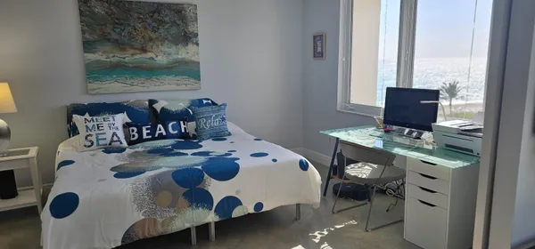 a living room with furniture and window