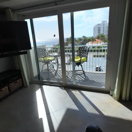 a view of a living room and bathroom