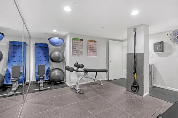 a view of a room with gym equipment