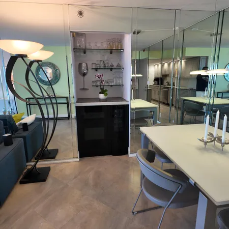 a kitchen with a table and chairs
