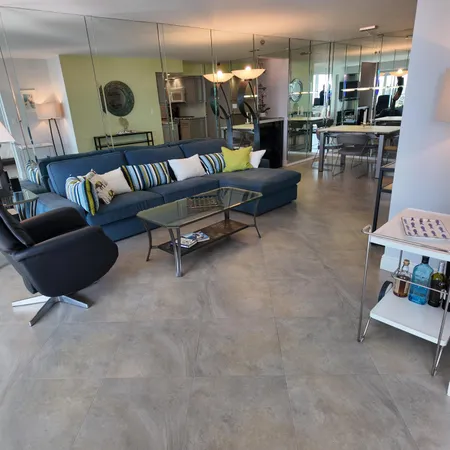 a living room with furniture and a table