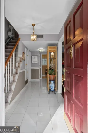 a view of an entryway with a livingroom