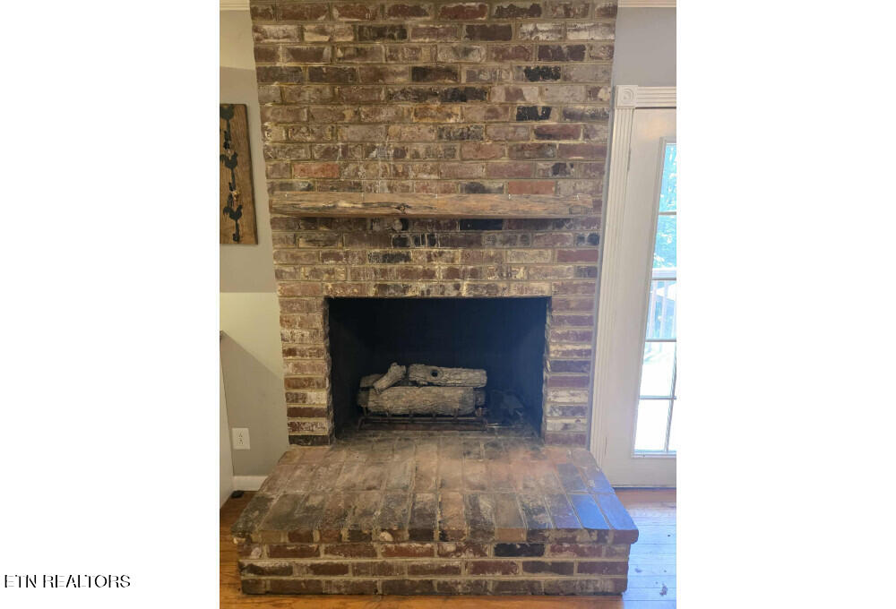 103 Neville Lane Oak Ridge, TN 37830 - Photo 11 of 46 image-11 - Kitchen Fireplace1756754897