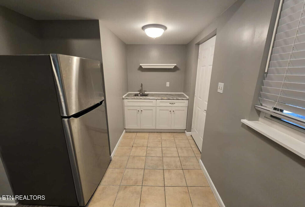 103 Neville Lane Oak Ridge, TN 37830 - Photo 35 of 46 image-35 - Downstairs Wet Bar1756754900
