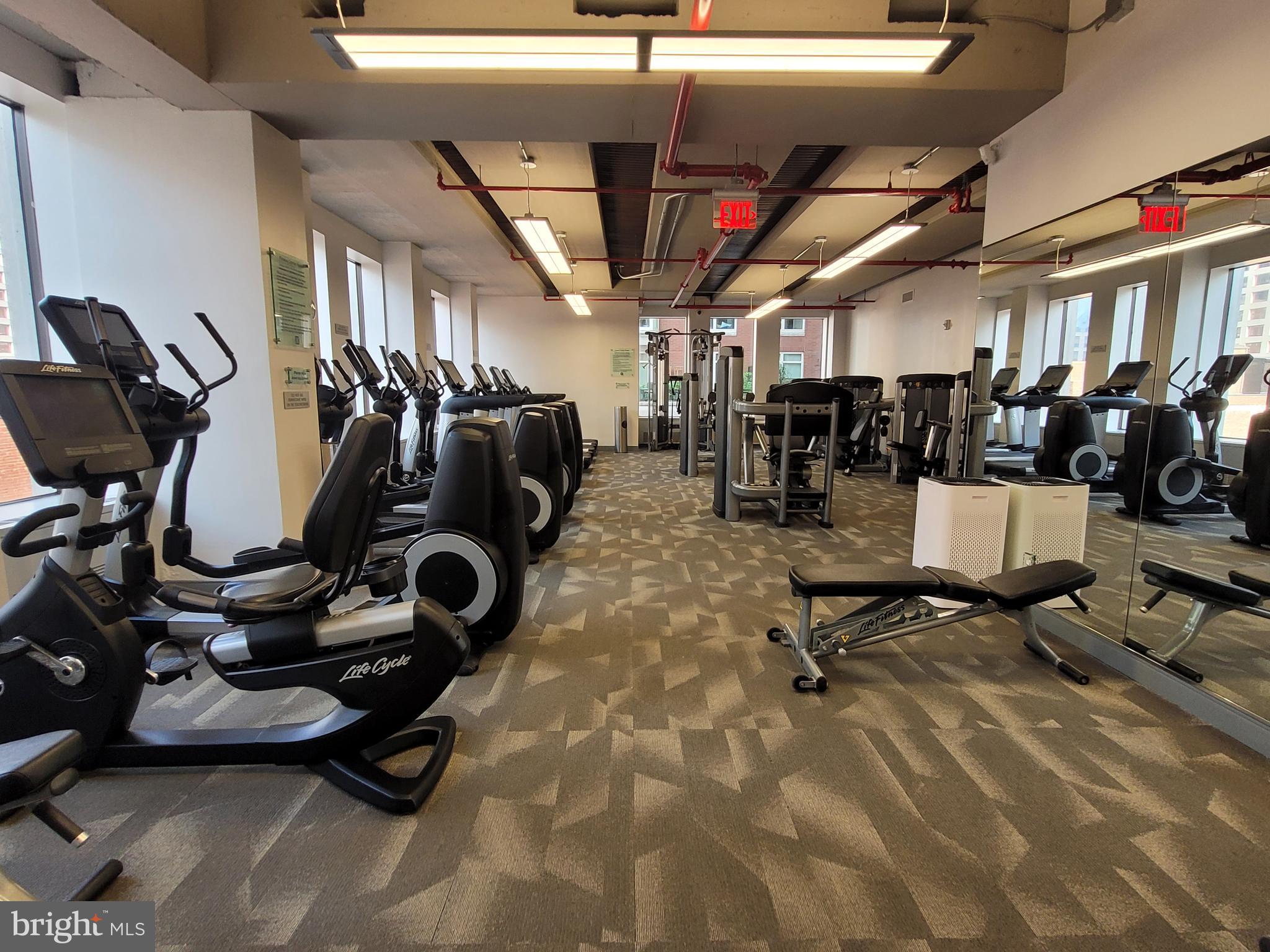135 South 19th Street, Unit 403 Philadelphia, PA 19103 - Photo 17 of 19 a view of a room with gym equipment