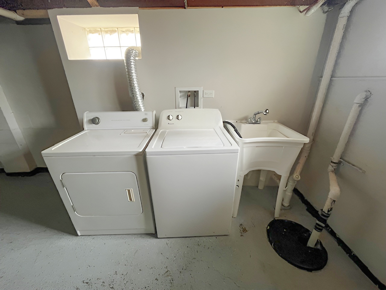 17943 Ridgewood Avenue Lansing, IL 60438 - Photo 12 of 12 a utility room with dryer and washer