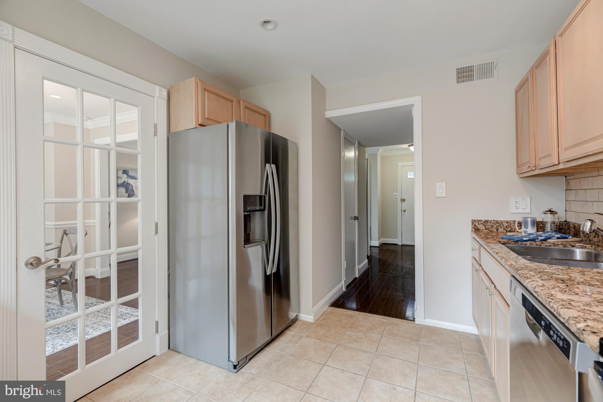 7709 Brandeis Way Springfield, VA 22153 - Photo 8 of 30 Kitchen French door to dining area
