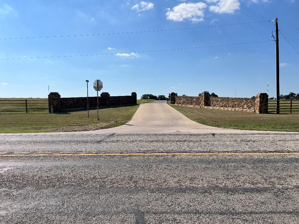 470 Granite Way Jacksboro, TX 76458 - Photo 19 of 20 a view of a dry yard with a slide