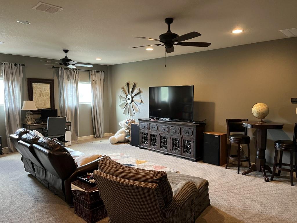 470 Granite Way Jacksboro, TX 76458 - Photo 7 of 22 a living room with furniture and a flat screen tv