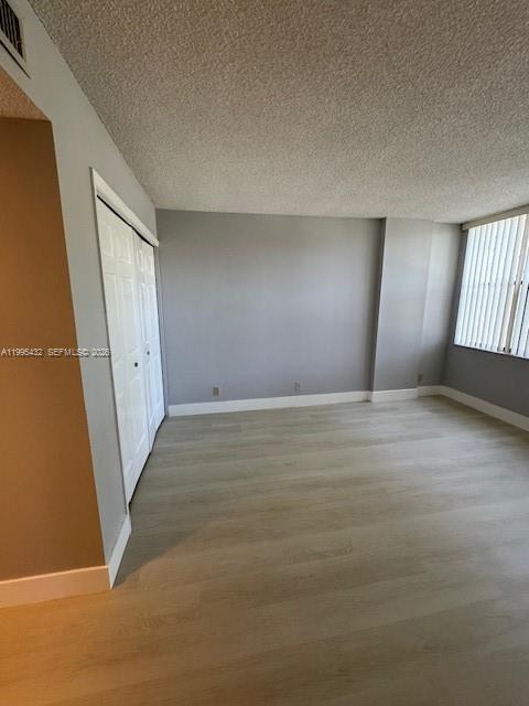 16300 Golf Club Road, Unit 208 Weston, FL 33326 - Photo 12 of 25 an empty room with windows