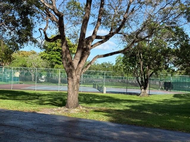 16300 Golf Club Road, Unit 208 Weston, FL 33326 - Photo 25 of 25 a view of a park with large trees