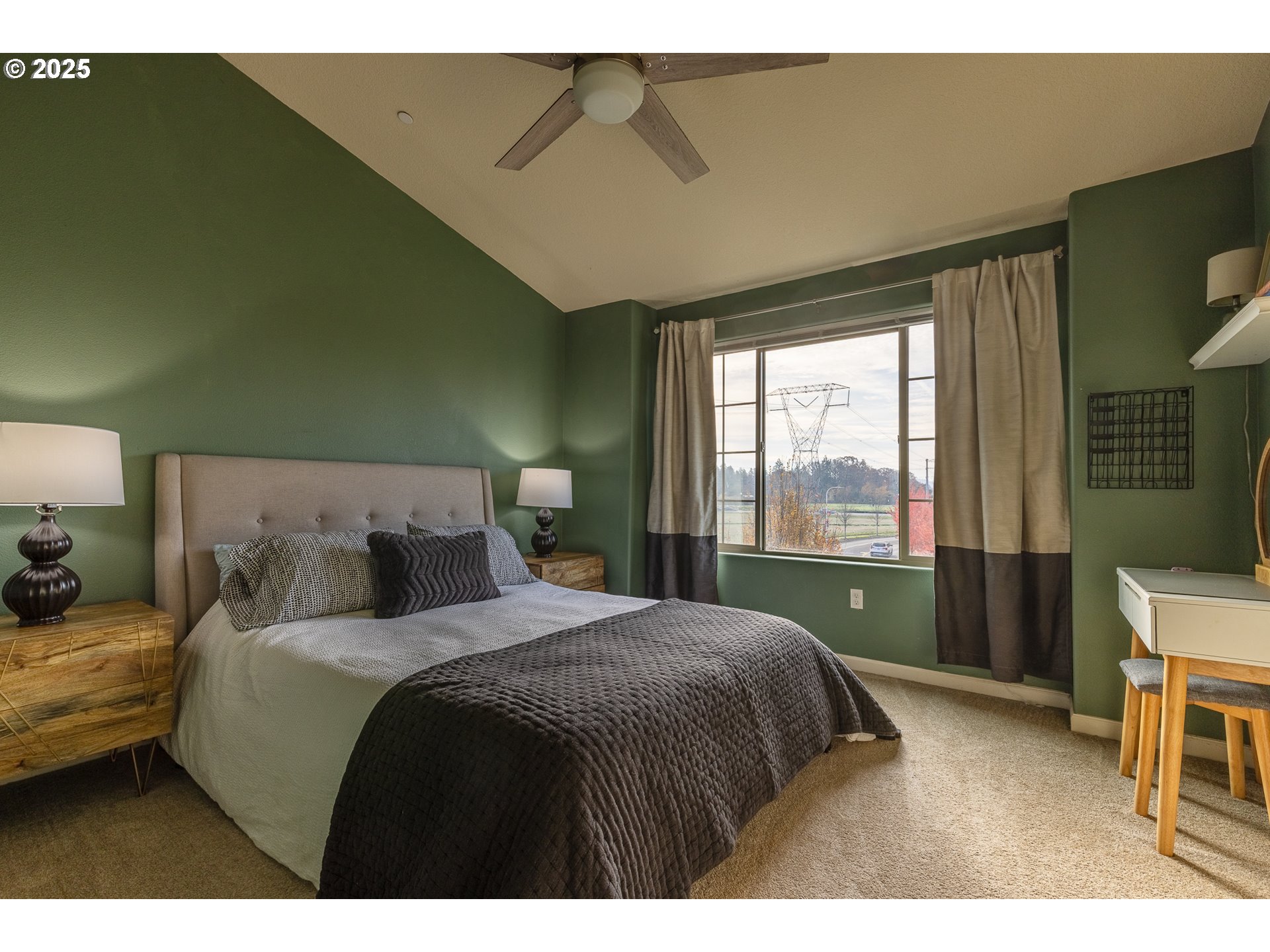 7974 Northeast Heiser Street Hillsboro, OR 97006 - Photo 19 of 32 a bedroom with a bed and a window