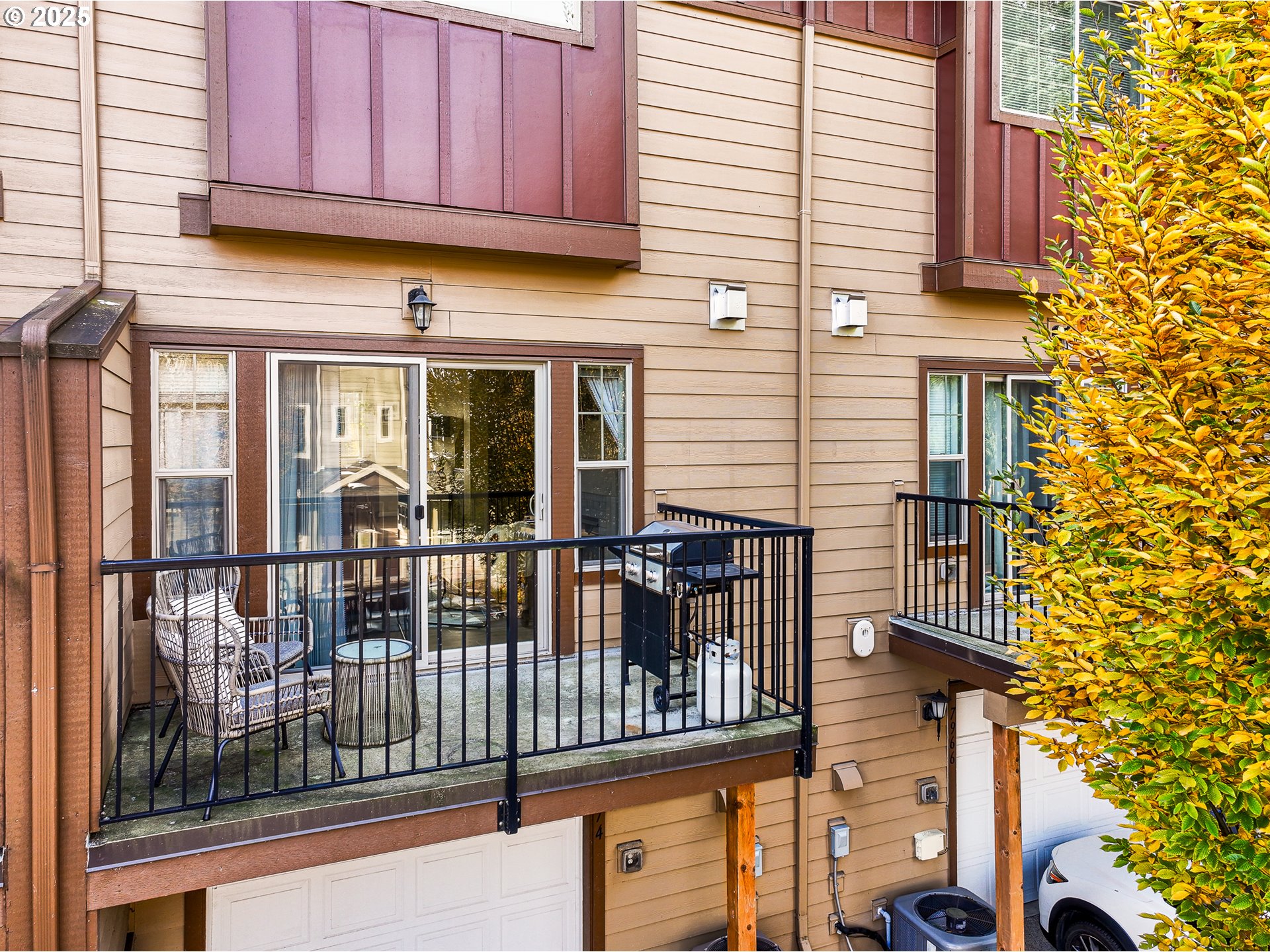 7974 Northeast Heiser Street Hillsboro, OR 97006 - Photo 25 of 32 a view of a house with a balcony
