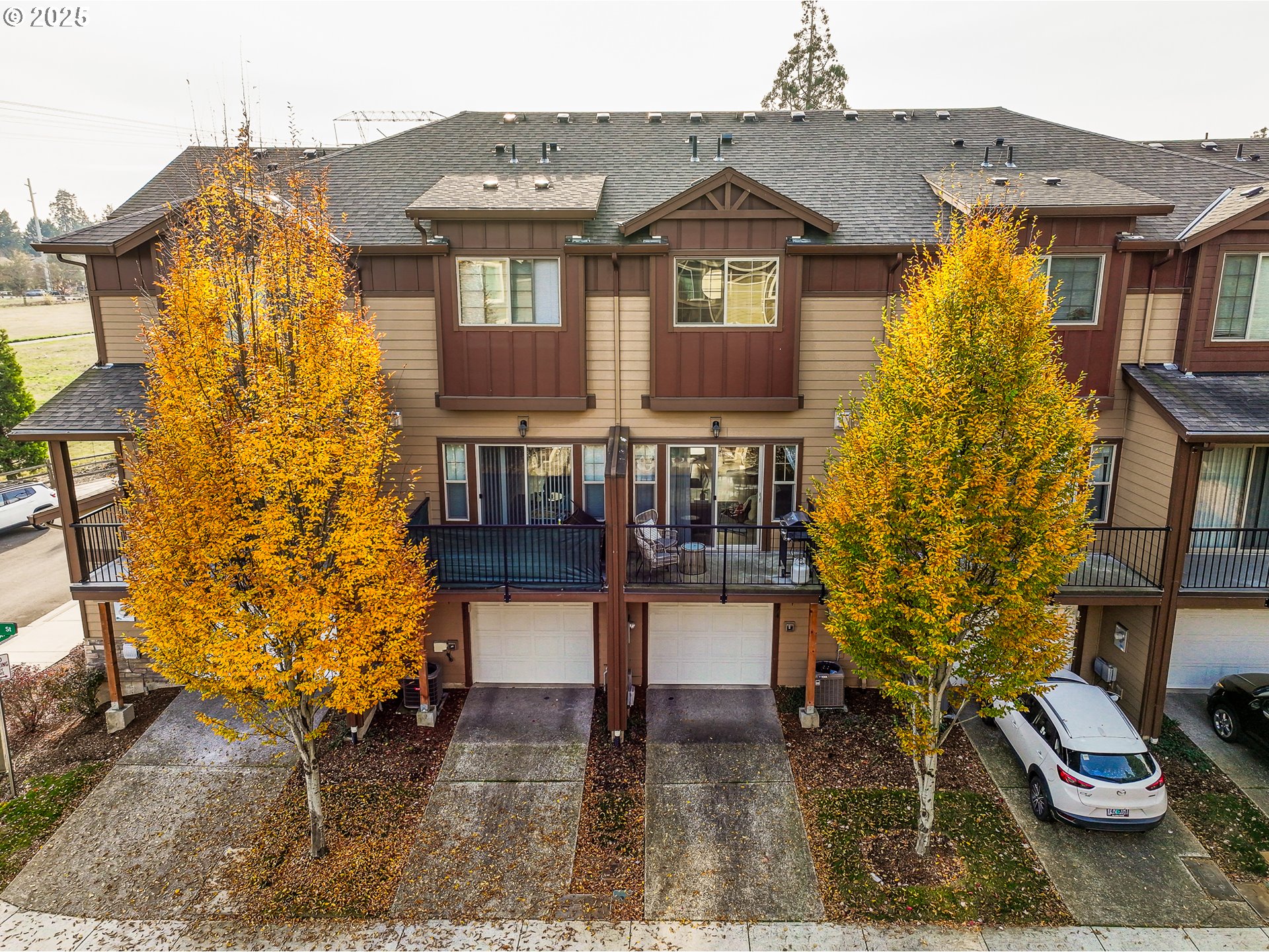 7974 Northeast Heiser Street Hillsboro, OR 97006 - Photo 27 of 32 a front view of a house with a yard