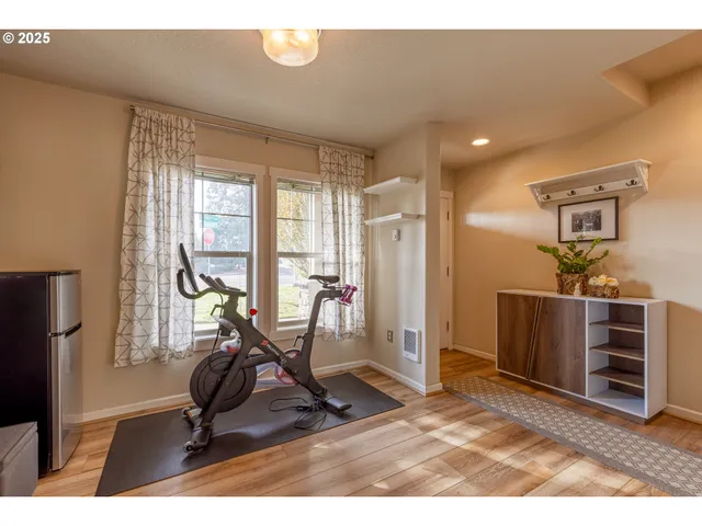 a view of a room with gym equipment