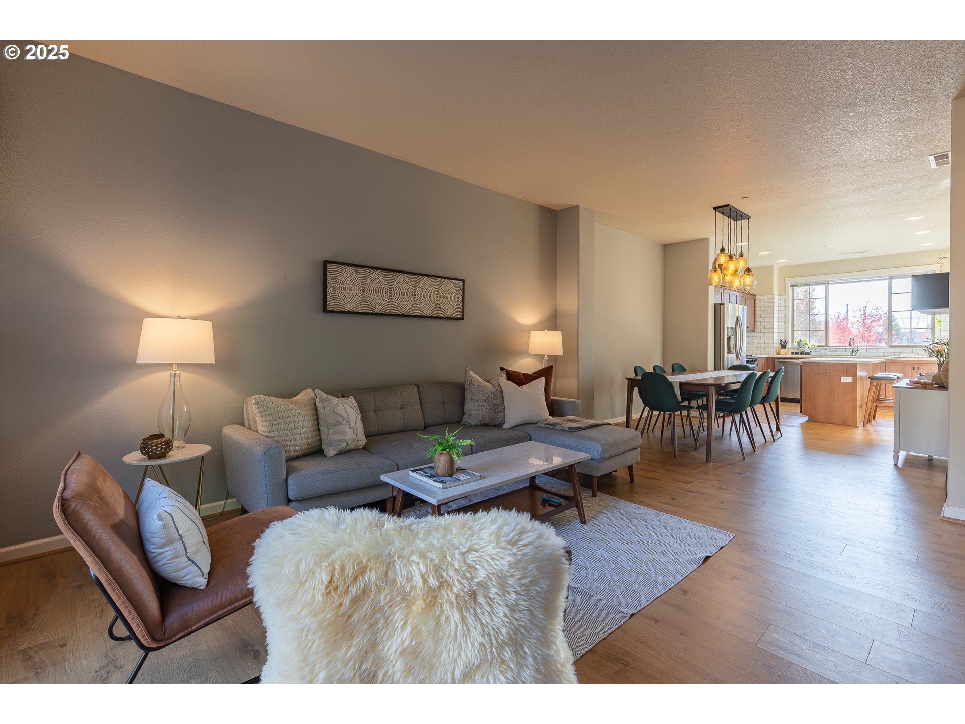 7974 Northeast Heiser Street Hillsboro, OR 97006 - Photo 6 of 32 a living room with furniture and wooden floor