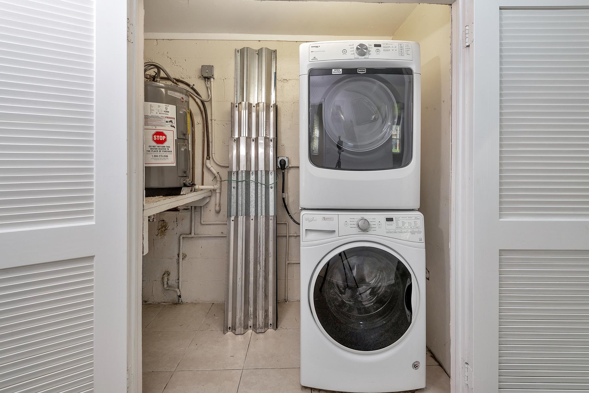 4882 Jefferson Road Delray Beach, FL 33445 - Photo 15 of 41 a utility room with dryer and washer