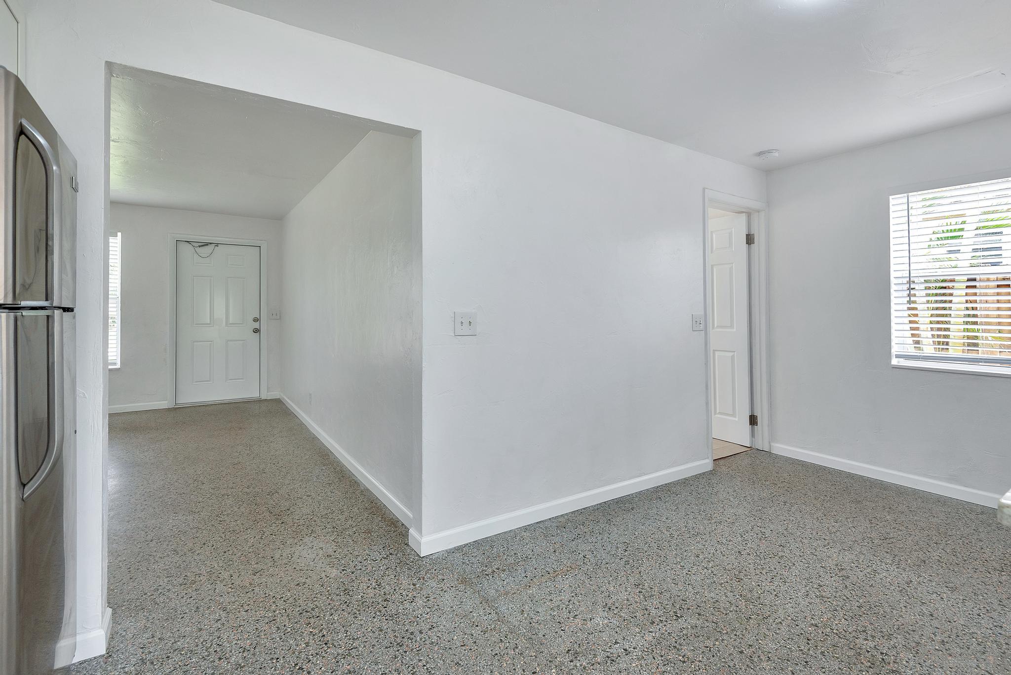 4882 Jefferson Road Delray Beach, FL 33445 - Photo 19 of 41 a view of an empty room with a window