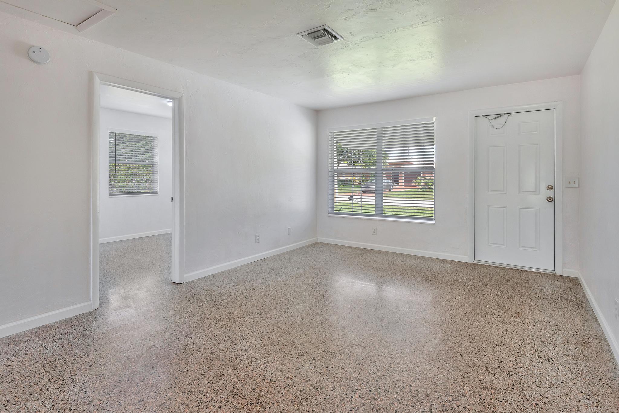 4882 Jefferson Road Delray Beach, FL 33445 - Photo 20 of 41 an empty room with windows and closet