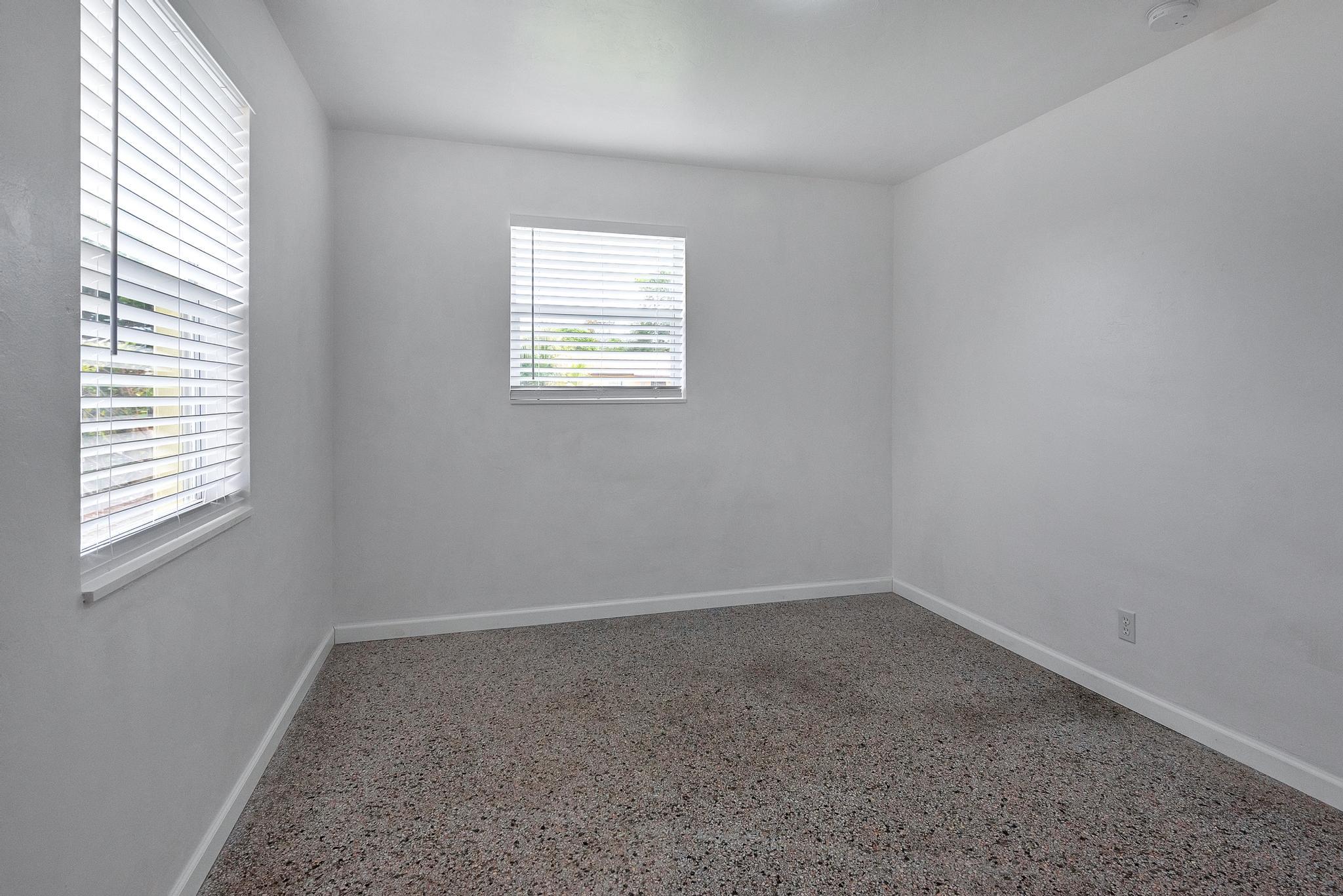 4882 Jefferson Road Delray Beach, FL 33445 - Photo 21 of 41 an empty room with a window