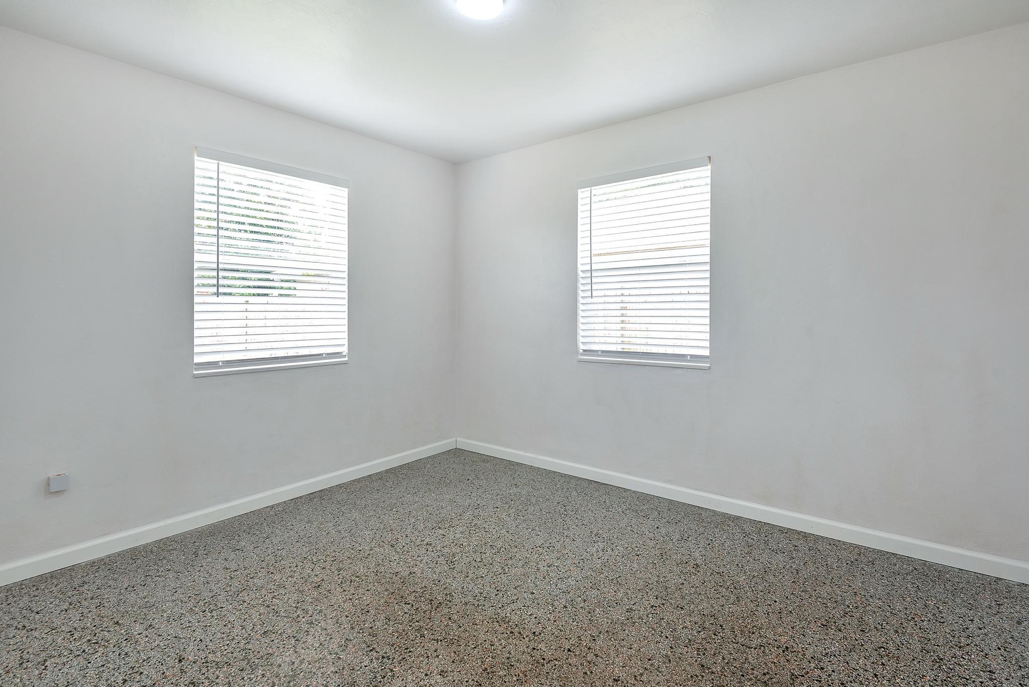 4882 Jefferson Road Delray Beach, FL 33445 - Photo 23 of 41 an empty room with a window