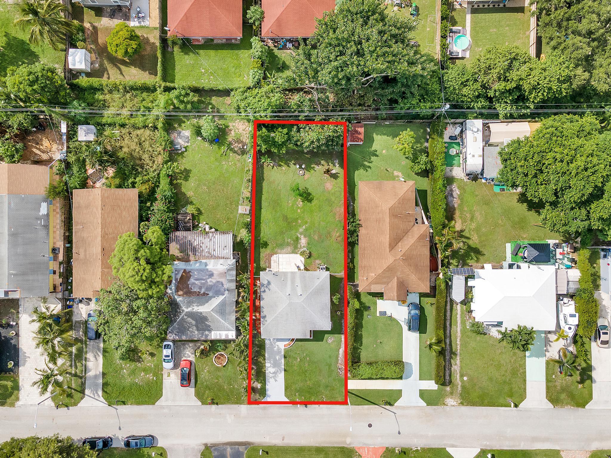 4882 Jefferson Road Delray Beach, FL 33445 - Photo 41 of 41 an aerial view of a houses with outdoor space