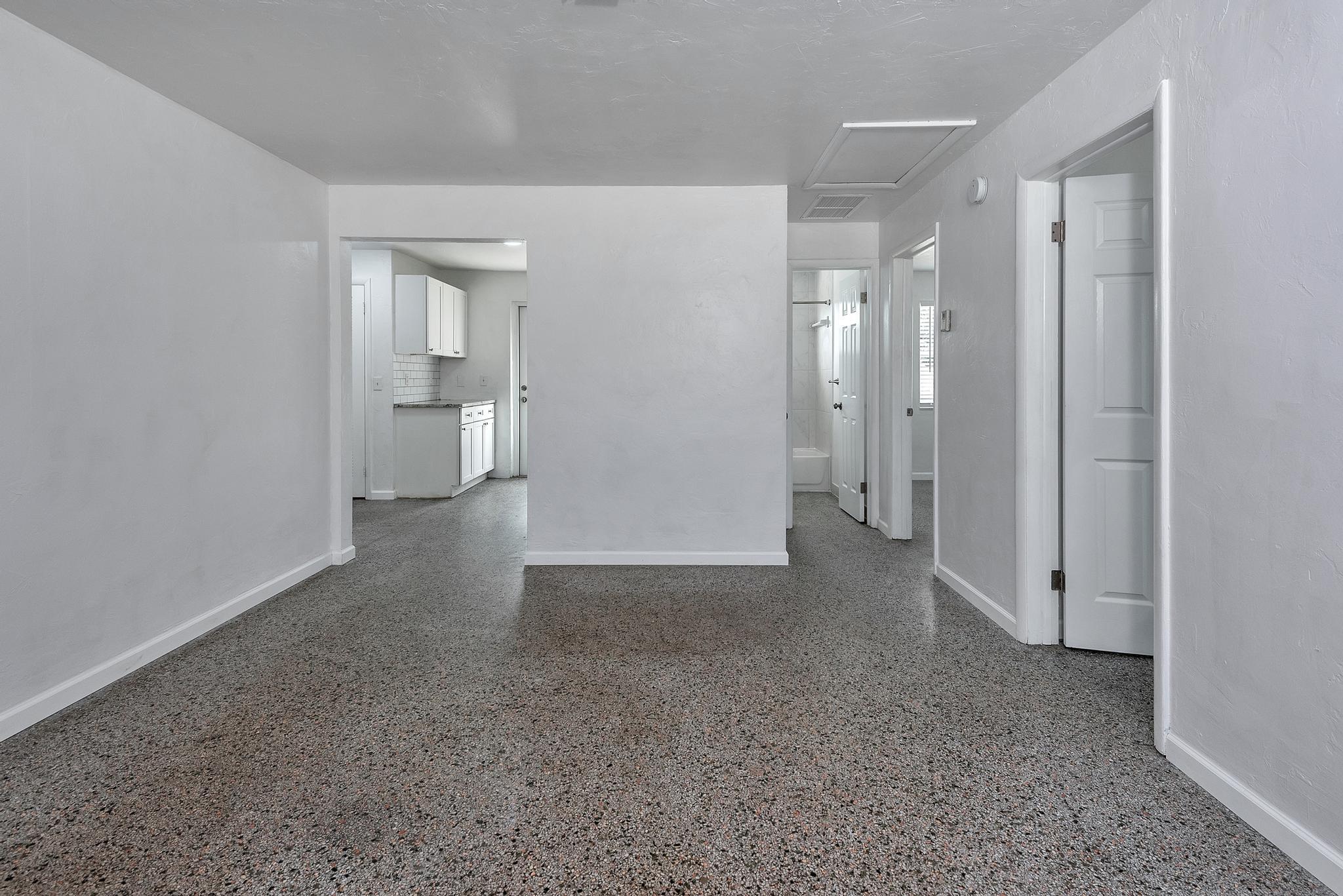 4882 Jefferson Road Delray Beach, FL 33445 - Photo 6 of 41 wooden floor in a room with a bathroom