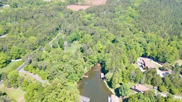 a view of a lake in middle of the house