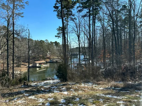 a view of a backyard of the house