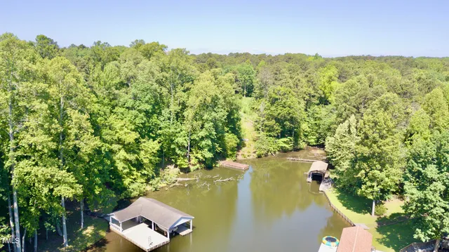 a view of a lake with a house