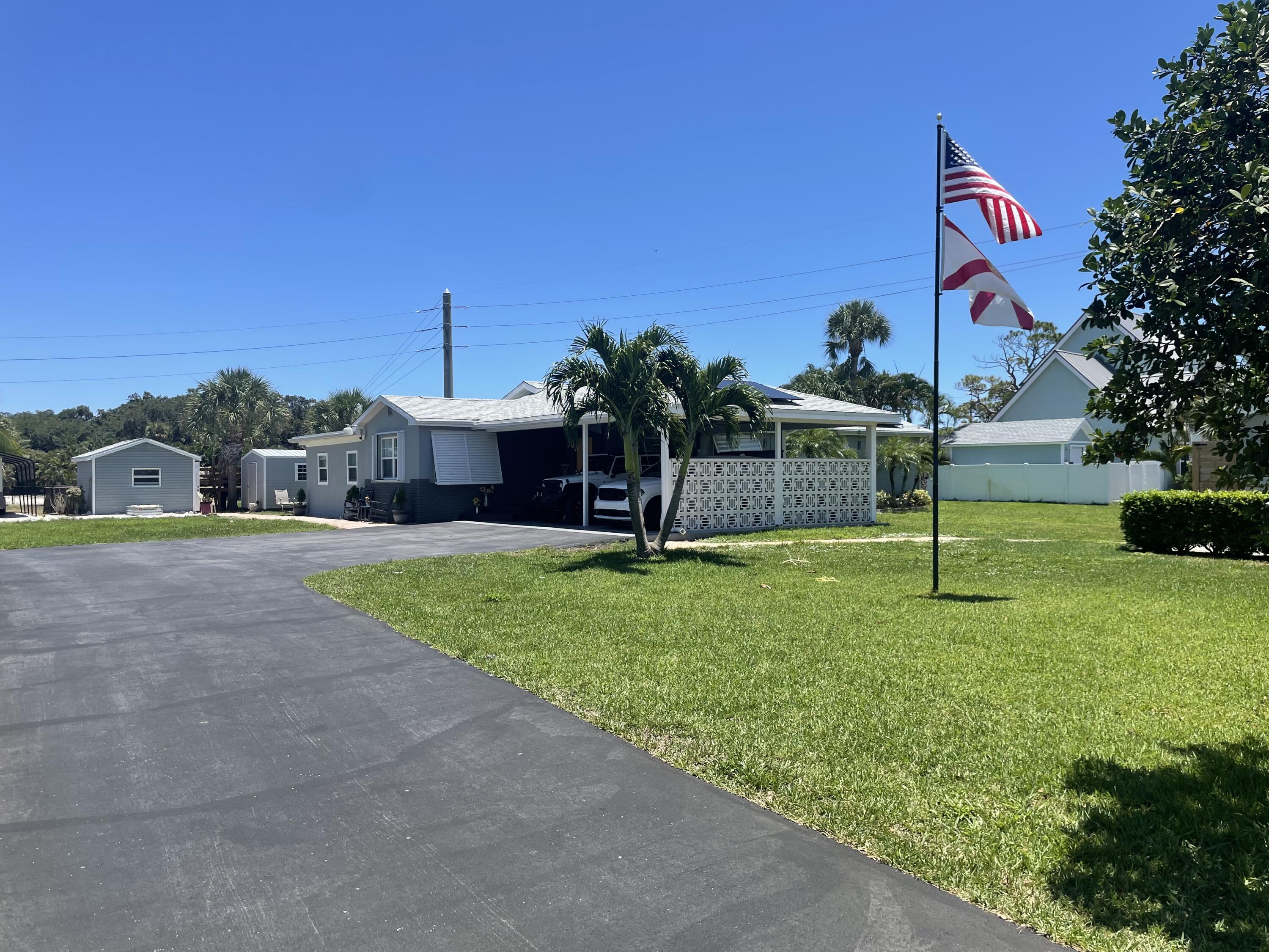 7100 Thompson Road Boynton Beach, FL 33426 - Photo 1 of 50 Front