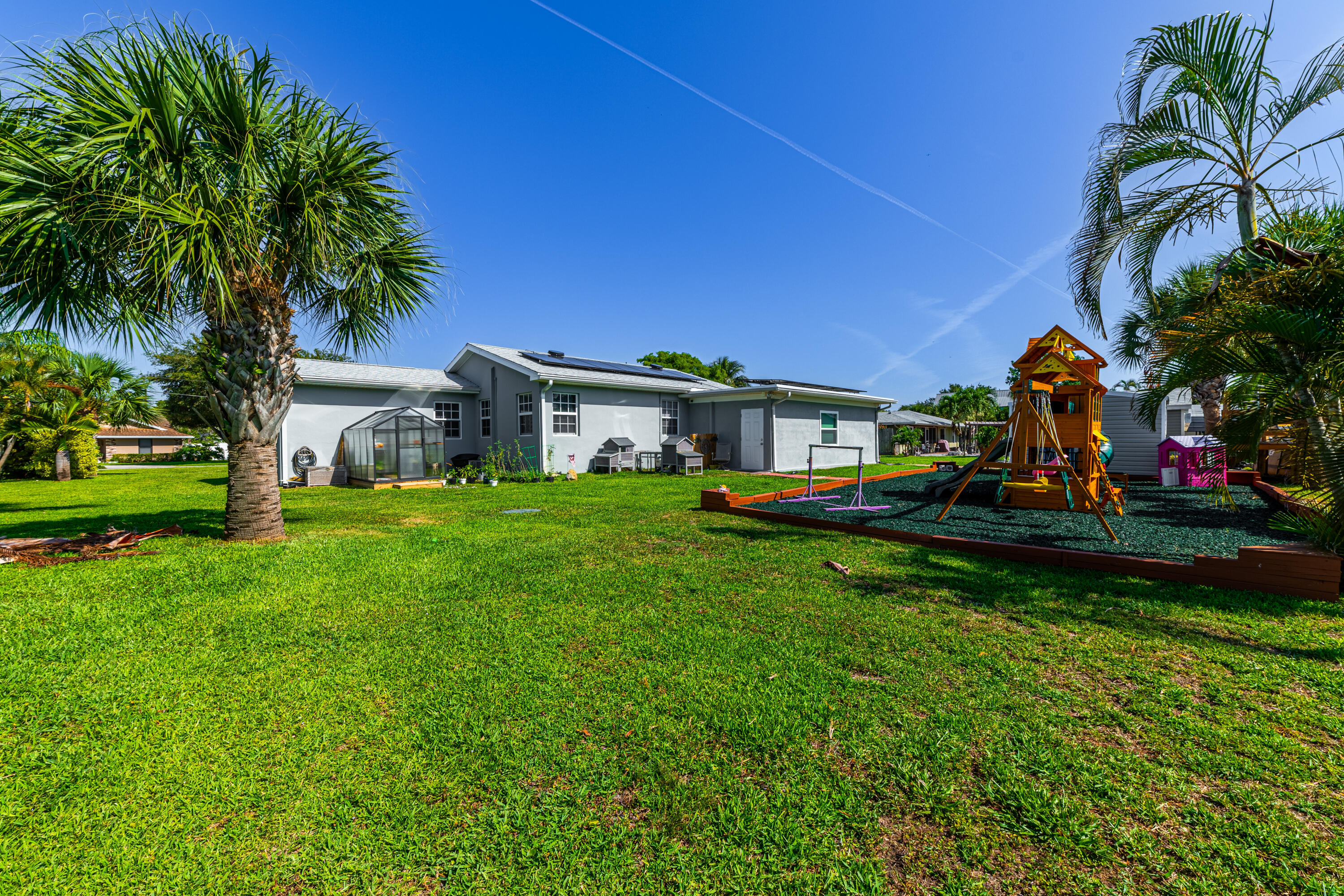 7100 Thompson Road Boynton Beach, FL 33426 - Photo 32 of 50 Main Home Rear Yard