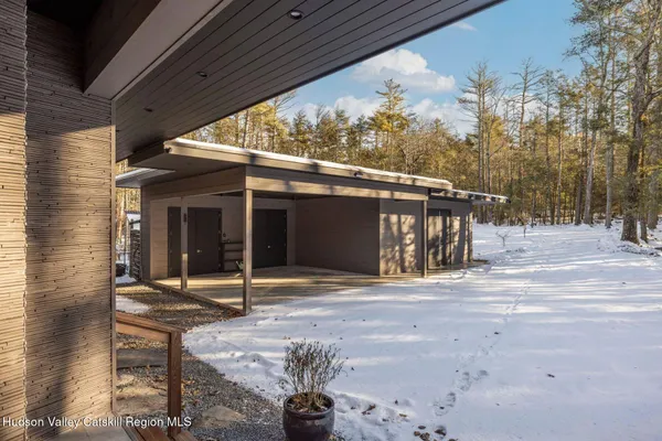 a view of a livingroom with furniture and a rug